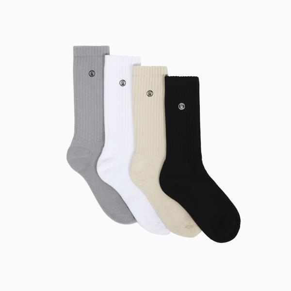 Pack de chaussettes Classic9To5 disposition chevauchées avec les coloris : gris, beige, noir et blanc