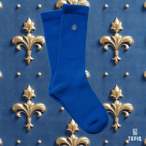 a pair of blue socks on a blue and gold background